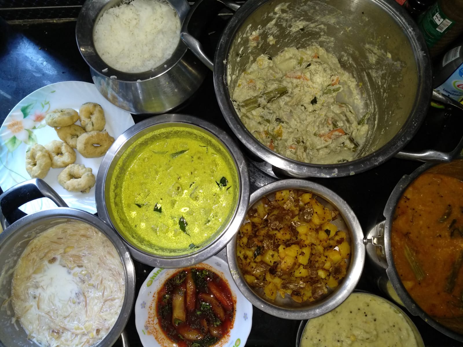 Sunday Tamil feast — a full spread of curries, rice and sides